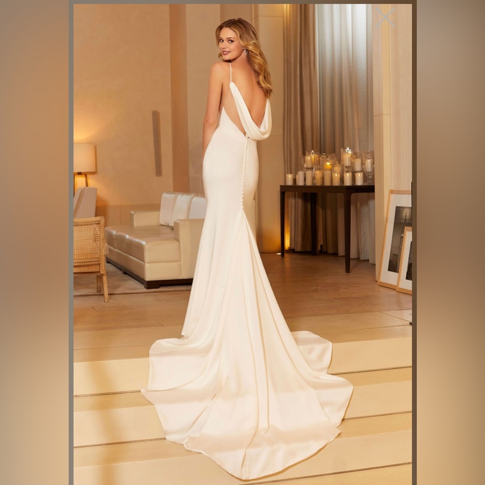 Brand new with tags Morilee wedding gown.